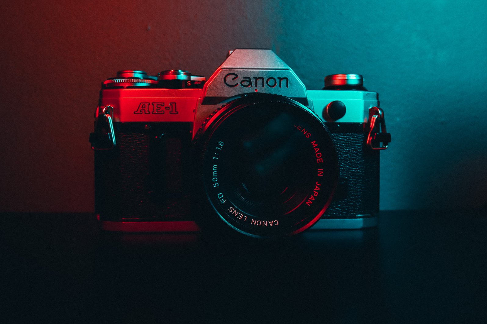 Canon camera with a blue and red overlay 